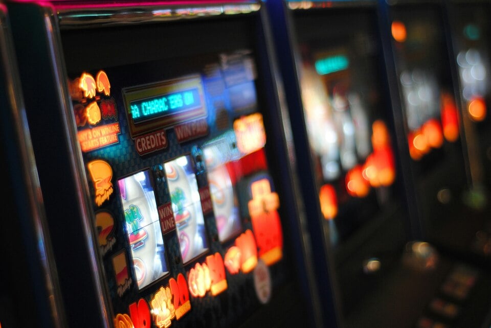 a row of casino slot machines